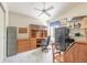 Spacious office with built-in desk, shelving, and a large safe for secure storage at 5430 Dubois Ave, Port Orange, FL 32127