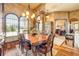 Formal dining room features a large wooden table and elegant decor near the office at 610 Mura Ct, New Smyrna Beach, FL 32168