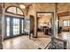 Spacious foyer with tile floors and office view at 610 Mura Ct, New Smyrna Beach, FL 32168