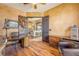 Office with hard wood flooring, decorative fixtures, and direct access to the living room at 610 Mura Ct, New Smyrna Beach, FL 32168