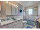 Classic bathroom with a shower, vanity, and functional fixtures at 6361 Turtlemound Rd, New Smyrna Beach, FL 32169