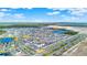 Expansive aerial view of a large residential community with multiple ponds at 6542 Rover Way, St Cloud, FL 34771