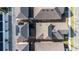 Overhead view of residential neighborhood, showing solar panels on roofs, landscaped yards, and the organized layout of homes at 6542 Rover Way, St Cloud, FL 34771