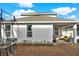 Backyard of home with a covered patio and trampoline to side at 6542 Rover Way, St Cloud, FL 34771