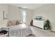 Cozy bedroom with a Christmas tree, dresser and stylish decorative accents at 6542 Rover Way, St Cloud, FL 34771