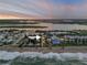 Aerial view of home near beach with water views at 6771 Turtlemound Rd, New Smyrna Beach, FL 32169