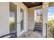 Balcony view of stairs and the outside at 6771 Turtlemound Rd, New Smyrna Beach, FL 32169