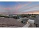 Enjoy fantastic Halifax River views at dusk from the rooftop over terracotta colored clay tile at 6771 Turtlemound Rd, New Smyrna Beach, FL 32169