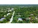 Aerial view of property showing surrounding neighborhood; lot lines are indicated by blue dotted line at 682 Ferncliff Dr, Port Orange, FL 32127
