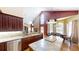Gourmet kitchen with granite countertops, stainless steel appliances, and ample cabinetry for storage at 682 Ferncliff Dr, Port Orange, FL 32127