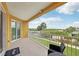 Open air balcony offers stunning views of the waterfront and surrounding landscape at 7 Riverwalk Dr # 205, New Smyrna Beach, FL 32169