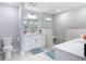 Luxurious bathroom with double vanity, spacious shower with glass enclosure, and modern fixtures at 7 Riverwalk Dr # 205, New Smyrna Beach, FL 32169