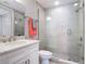 Contemporary bathroom with a glass-enclosed shower, and a vanity with granite countertop at 7 Riverwalk Dr # 205, New Smyrna Beach, FL 32169