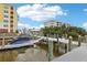 Community boat docks and lifts for easy boating access, featuring well-maintained piers and stunning water views at 7 Riverwalk Dr # 205, New Smyrna Beach, FL 32169