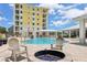 Resort-style pool area features a luxurious pool and outdoor fire pit at 7 Riverwalk Dr # 205, New Smyrna Beach, FL 32169