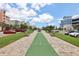 Community shuffleboard court with seating at 7 Riverwalk Dr # 205, New Smyrna Beach, FL 32169