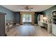 Versatile bonus room with ample natural light, a built-in desk, and plenty of space at 706 S Timberlane Dr, New Smyrna Beach, FL 32168