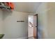 Room with a wall-mounted animal design, open doorway, and white walls at 706 S Timberlane Dr, New Smyrna Beach, FL 32168