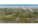 Aerial view of coastal home near the beach, surrounded by lush greenery and serene waterfront at 825 E 23Rd Ave, New Smyrna Beach, FL 32169