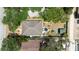 Aerial view of the home showcasing the backyard, landscaping, and proximity to nearby amenities at 825 E 23Rd Ave, New Smyrna Beach, FL 32169
