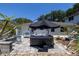 Relaxing backyard with hot tub, patio and outdoor furniture perfect for entertaining at 825 E 23Rd Ave, New Smyrna Beach, FL 32169