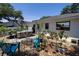 Spacious backyard with a hot tub, patio, and lush landscaping creating a private oasis at 825 E 23Rd Ave, New Smyrna Beach, FL 32169