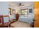 Bright bedroom with windows and a nautical theme decor at 825 E 23Rd Ave, New Smyrna Beach, FL 32169