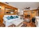 Comfortable living room with hardwood floors and view of the kitchen at 825 E 23Rd Ave, New Smyrna Beach, FL 32169