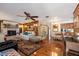 Spacious living room featuring hardwood floors and a fireplace at 825 E 23Rd Ave, New Smyrna Beach, FL 32169