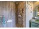 Modern tiled walk-in shower with a built-in bench and dual shower heads at 825 E 23Rd Ave, New Smyrna Beach, FL 32169