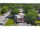 High-angle perspective of the community's layout, showing buildings, landscaping, and parking at 95 Moonstone Ct, Port Orange, FL 32129