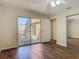 Well-lit bedroom boasting gleaming floors and sliding glass doors leading to the outdoor patio at 95 Moonstone Ct, Port Orange, FL 32129