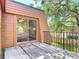 This patio features a sliding glass door that provides natural light to the interior space at 95 Moonstone Ct, Port Orange, FL 32129