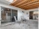 Enclosed patio with sliding glass doors and view of the backyard area and outdoor seating at 95 Moonstone Ct, Port Orange, FL 32129