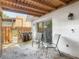 Enclosed patio with sliding glass doors, chairs, and a view of the fenced backyard area at 95 Moonstone Ct, Port Orange, FL 32129