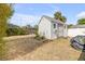 Backyard shed on a sunny day; great for storage and outdoor activities at 995 16Th St, Edgewater, FL 32132