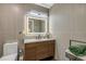 Modern bathroom with decorative lighting, tiled walls, and sleek vanity at 995 16Th St, Edgewater, FL 32132