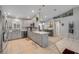 Spacious kitchen with gray cabinets, stainless steel appliances, quartz countertops, and an open layout at 995 16Th St, Edgewater, FL 32132