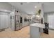 Modern kitchen featuring gray cabinets, stainless steel appliances, quartz countertops, and plenty of storage at 995 16Th St, Edgewater, FL 32132