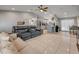 Expansive living room showcasing an open floor plan, neutral decor, and seamless flow to the kitchen at 995 16Th St, Edgewater, FL 32132