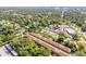 An aerial view of the neighborhood with mature trees at 114 Hickory St, New Smyrna Beach, FL 32168