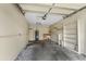 Spacious garage with built-in shelves, water heater, and ample storage potential at 115 Bob White Ct, Daytona Beach, FL 32119