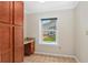 Bright and functional kitchen area with custom cabinetry and a window offering natural light at 115 Bob White Ct, Daytona Beach, FL 32119