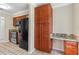 Well-appointed kitchen includes modern appliances, granite counters, and custom built-in desk at 115 Bob White Ct, Daytona Beach, FL 32119