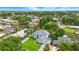Stunning aerial view of a home with a well-manicured lawn in a waterfront community at 128 Godfrey Rd, Edgewater, FL 32141