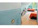 View of themed bedroom complete with decor, twin beds, vaulted ceiling and carpeted floor at 128 Godfrey Rd, Edgewater, FL 32141