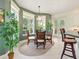 Charming breakfast nook with lots of light coming from the large windows at 128 Godfrey Rd, Edgewater, FL 32141