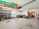 Well-organized garage with plenty of space for storage, workbench, tools, and other equipment at 128 Godfrey Rd, Edgewater, FL 32141
