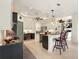 Open kitchen featuring granite countertops, an island, and easy access to the living area at 128 Godfrey Rd, Edgewater, FL 32141