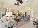 Spacious living room with tile floors, soaring ceilings, and comfortable seating at 128 Godfrey Rd, Edgewater, FL 32141